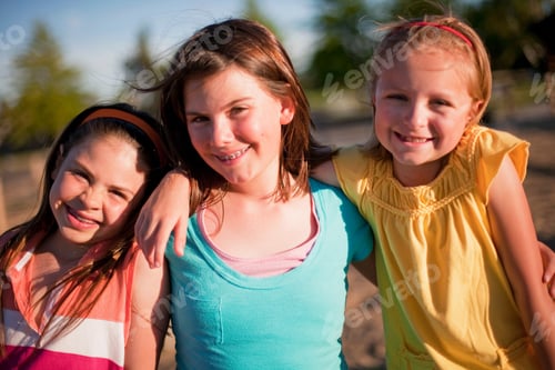 Preview: 3 Smiling Young Girls Hugging
