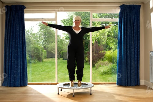 Preview: Woman Jumping On Exercise Trampoline