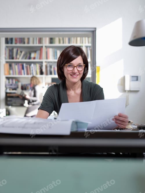 Preview: Young Architect Working In Office