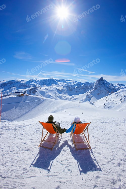 Preview: Couple Reclining In Deck Chairs