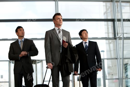 Preview: Businessmen Arriving At Airport