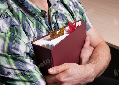 Preview: Leaves In Businessmans Folder