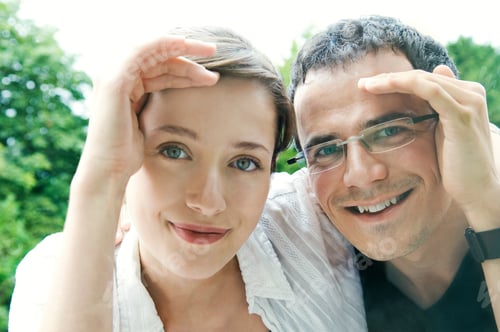 Preview: A Young Couple Look Through A Window