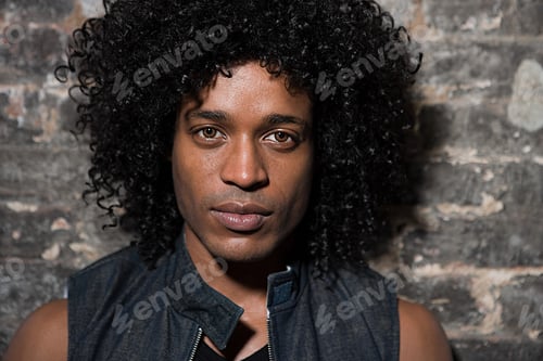 Preview: Portrait Of A Young Man With Curly Hair