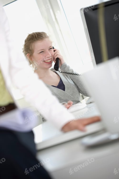 Preview: Girl With Telephone Receiver Laughing In