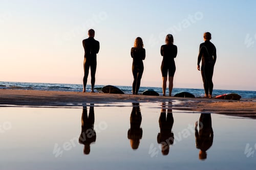 Preview: Four People Standing On The Beac
