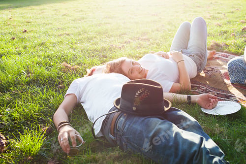 Preview: Romantic Young Couple Relaxing At Party Picnic In Park