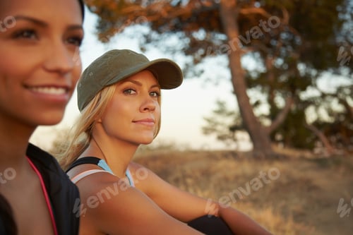 Preview: Women Sitting On Grass