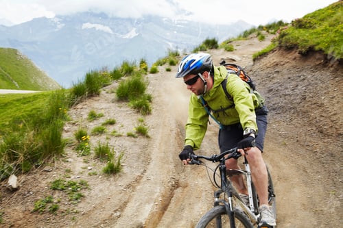 Preview: Mountain Biker On Dirt Road