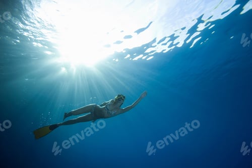 Preview: Woman Snorkeling Underwater