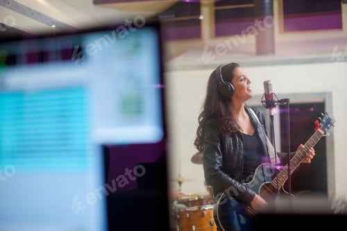 Preview: Young Woman Recording In Studio