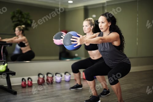 Preview: Women Working Out With Gym Ball In Gym