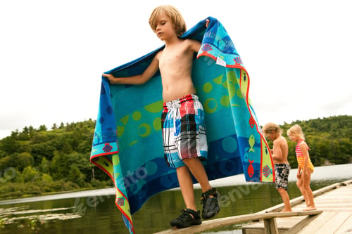 Preview: Boy On A Pier With Towel