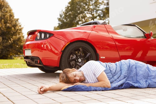 Preview: Man Sleeping Next To His Electric Car