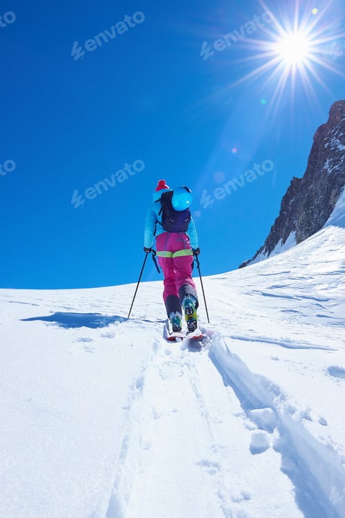 Preview: Rear View Of Mature Female Skier Moving Up Mont Blanc Massif, Graian Alps, France