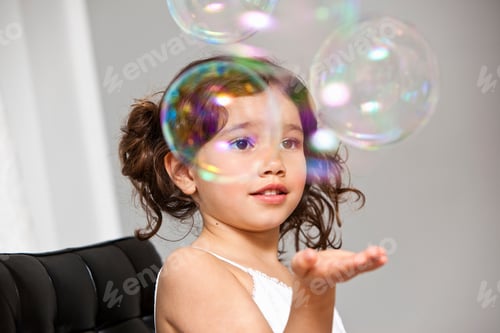 Preview: Beautiful Girl Trying Catch Soap Bubbles