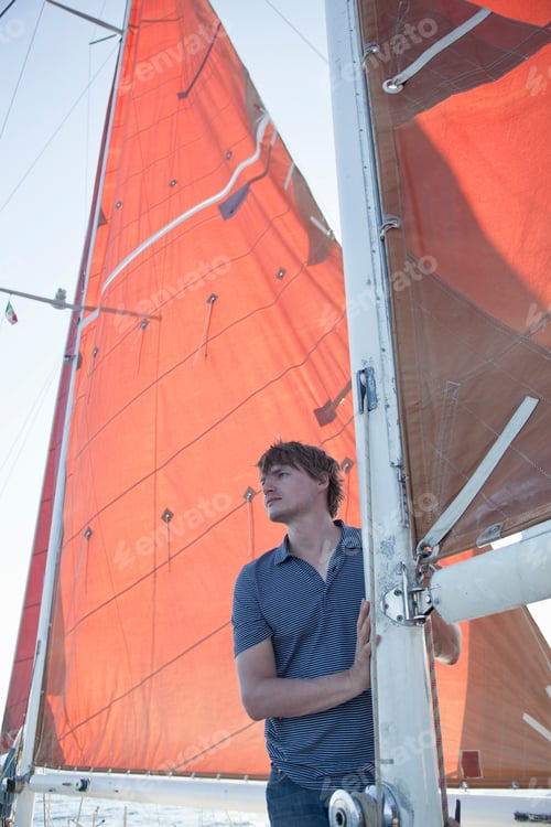 Preview: Man Standing On A Boat Smiling