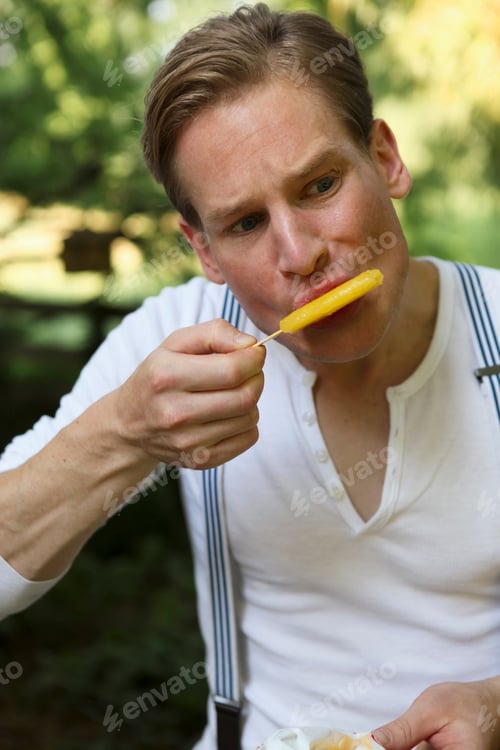 Preview: Young Male Eating Ice Cream