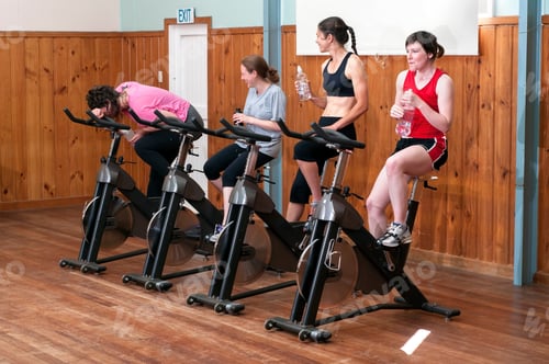 Preview: Exhausted Woman In Spinning Class