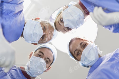 Preview: Doctors Examining Patient On Table