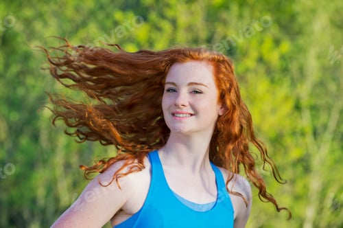 Preview: Portrait Of Teenage Girl With Long Red Hair