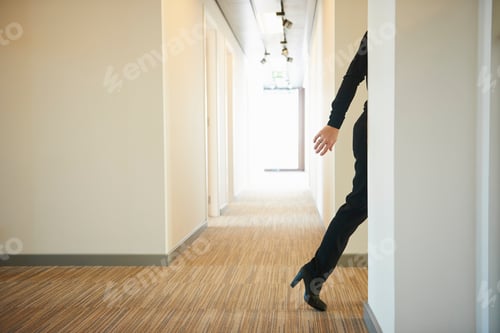 Preview: Woman Walking Across Corridor