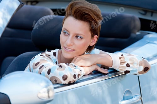 Preview: Woman Leaning Out Of Car Window