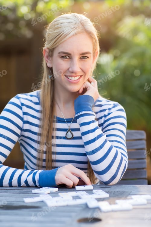 Preview: Portrait Of Young Woman Wearing Blue And White Top