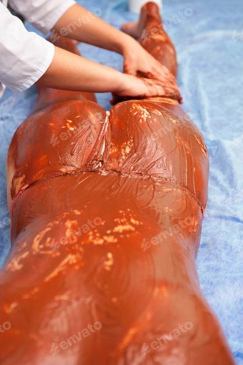 Preview: Woman Receiving Cosmetic Chocolate Mask