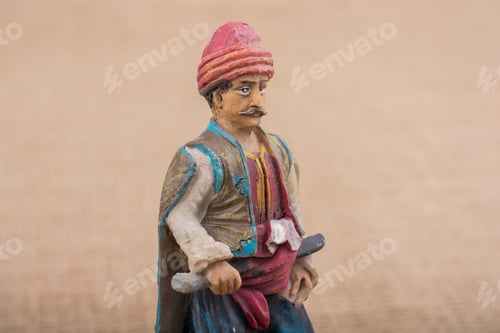 Preview: Turkish Ottoman Man Figurine In View On A Brown Backgorund