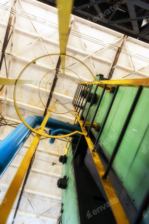 Preview: Large Yellow Ladder In Industrial Interior Photo
