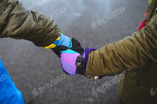 Preview: Man Holding Woman'S Hand In Mittens