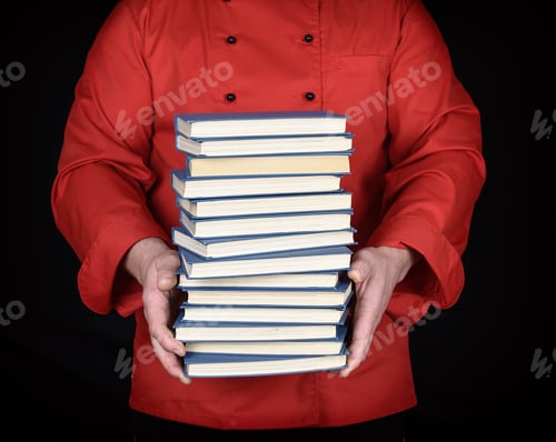 Preview: Man In Red Uniform Holds A Stack Of Books With A Blue Cover, Black Background