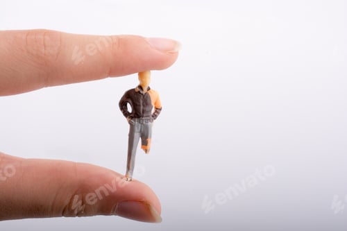 Preview: Little Man Figure With A Person With A Disability Leg In Hand On A White Background
