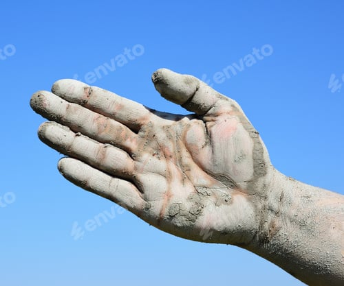 Preview: Man'S Open Palm Smeared With Mud Against The Blue Sky