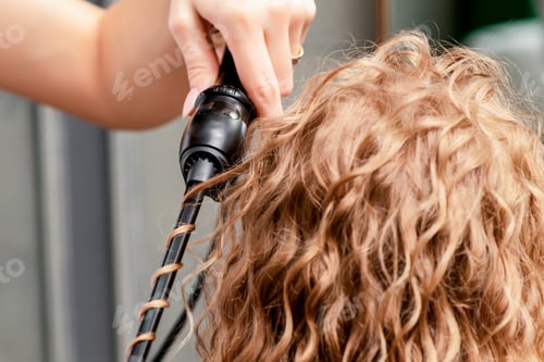 Preview: Process Of Making Curls By Curling Iron In Hairdressing Salon.