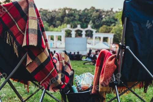 Preview: Two Folding Chairs With Cooling Bag With Beer And Snacks In Open Air Cinema Copy Space