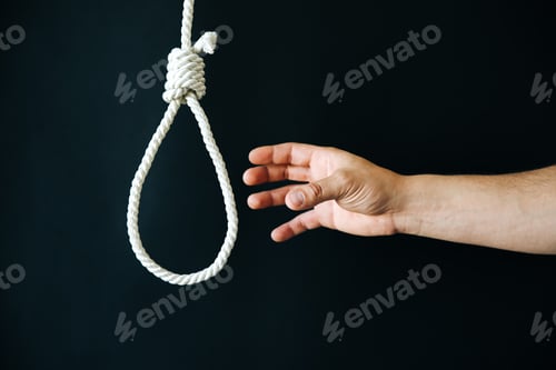 Preview: Hand Near The Noose On Black Background. Suicide Concept. Hanging Because Of Work Stress