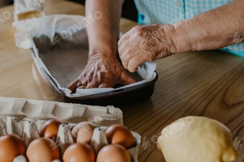 Preview: Woman In The Kitchen Making Christmas Desserts Or Pastries