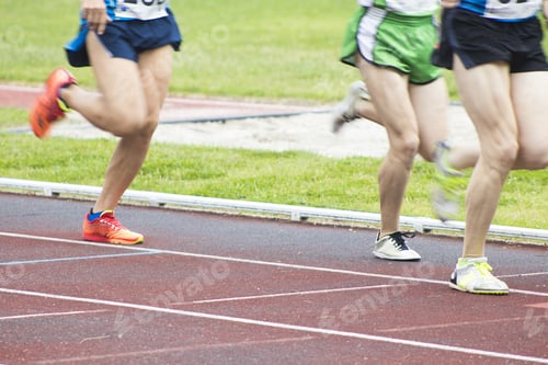 Preview: Athletes Running On The Athletics Track