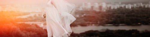 Preview: Young Bride In White Dress On Cityscape Background