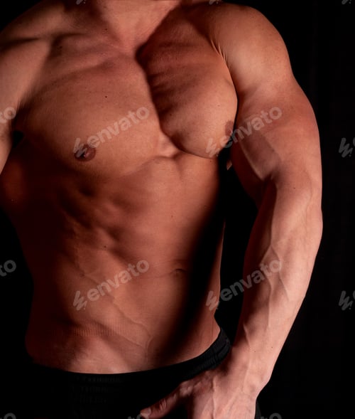 Preview: Muscular Male Torso Of Bodybuilder On Black Background