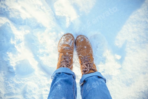 Preview: Boots In Snow On Sunny Winter Day