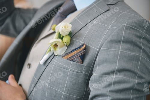Preview: White Flower Boutonniere On Groom'S Jacket