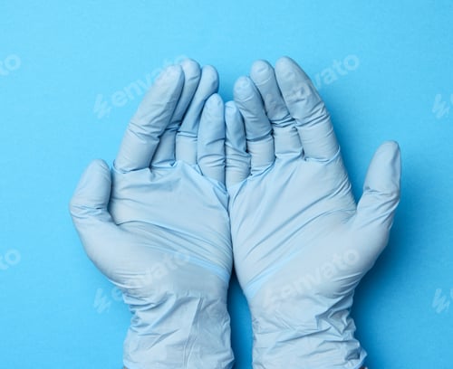 Preview: Two Female Hands In Blue Latex Gloves, Doctor'S Palms On A Blue Background, Top View