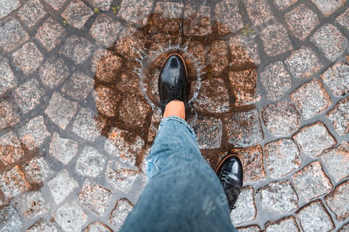 Preview: First Person Point Of View Woman Step Into Puddle In Black Shoes. Autumn Is Coming