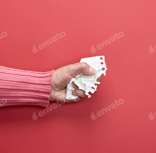 Preview: Female Hand Holding A White Crumpled Sheet Of Paper, Copy Space