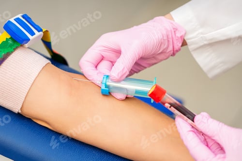 Preview: Nurse On Pink Gloves Takes Blood Sample From Vein From Female Patient In Medical Laboratory