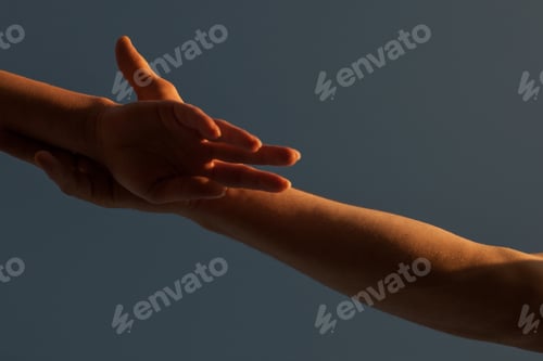 Preview: Young Adult Male Groom And Female Bride Holding Hands On Beach At Sunset.