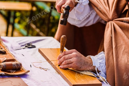 Preview: Artisans Disguised In Medieval Times Showing Old Crafts In A Festival Exhibition.
